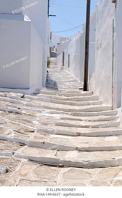 Stone steps up a path through the houses of Pano Petali in Sifnos, The Cyclades, Greek Islands, Greece, Europe