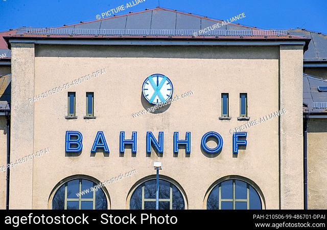 28 April 2021, Mecklenburg-Western Pomerania, Pasewalk: The clock on the station building does not work and is taped off