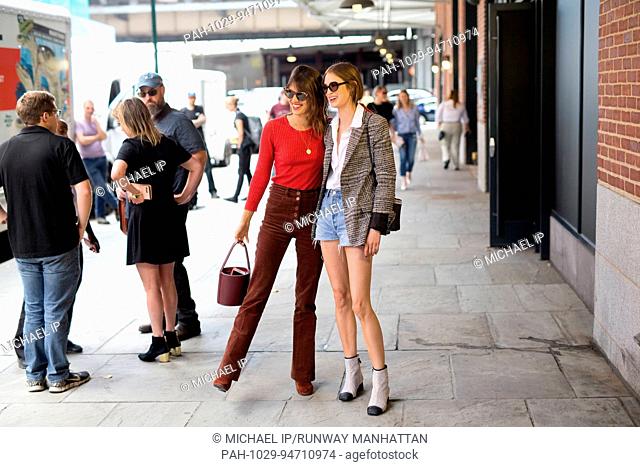 Model Jeanne Damas and a chic showgoer posing outside of the Jason Wu runway show during New York Fashion Week - Sept 8, 2017 - Photo: Runway Manhattan/Michael...