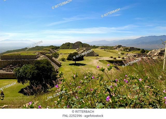 Old ruins of pyramids on landscape, Monte Alban, Oaxaca, Mexico