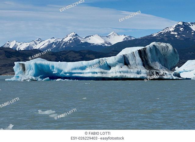 Spectacular blue iceberg floating on the Lake Argentino in the Los Glaciares National Park, Patagonia, Argentina
