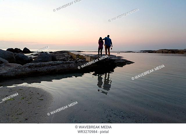 Couple standing near sea side