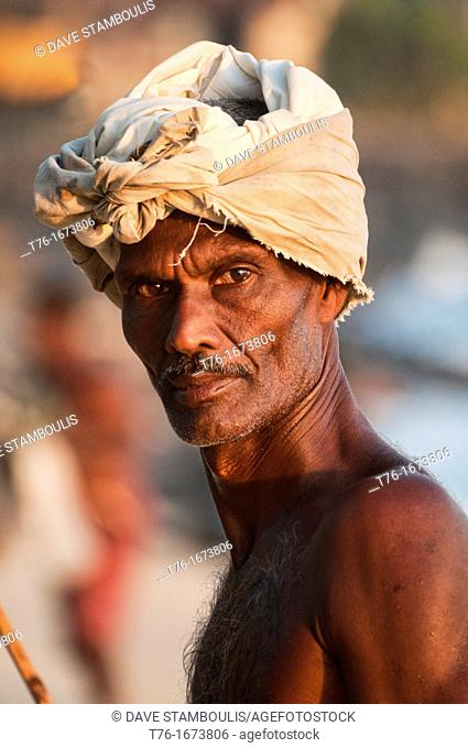 portrait of a stilt fisherman in Midigama, Sri Lanka