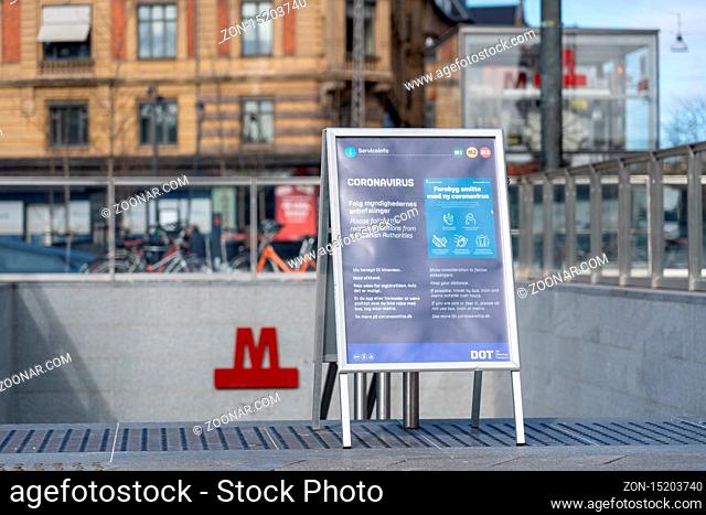 Copenhagen, Denmark - March 20, 2020: Sign at Town Hall metro station informing about the coronavirus