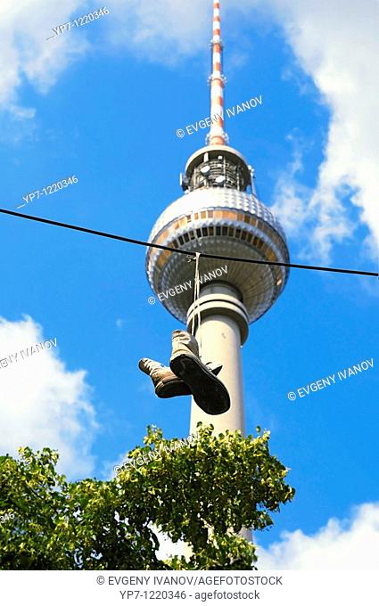 Sneakers on wire with Berlin TV Tower