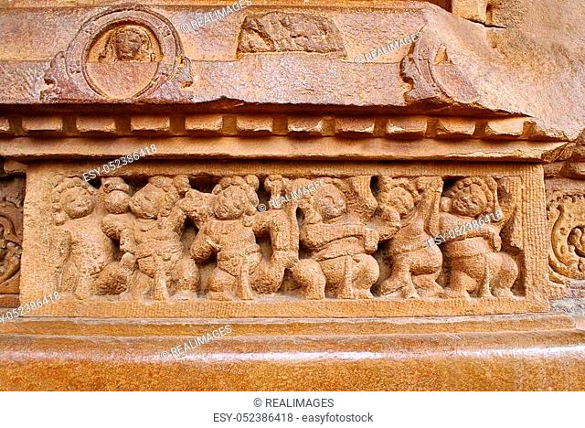 Figures of the shiva ganas (servants of the lord Shiva) carved on the plinth, Durga temple, Aihole, Bagalkot, Karnataka, India