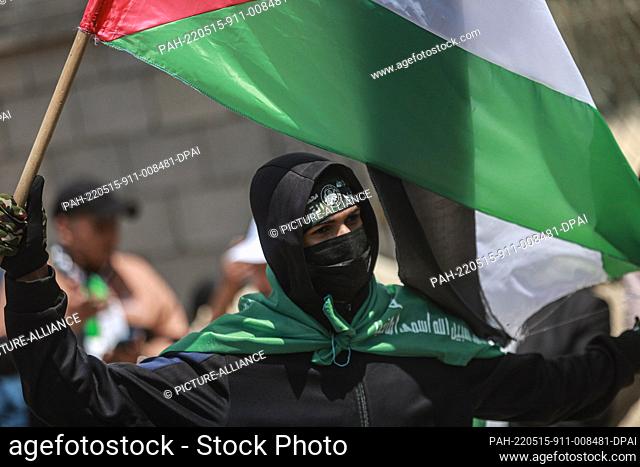 15 May 2022, Palestinian Territories, Gaza City: A supporter of Izz ad-Din al-Qassam Brigades, ..the military wing of the Palestinian organization Hamas