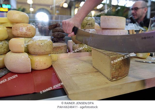 Different kinds of cheeses from the Uckermark region are offered during the Berlin Cheese Days in the Arminius Market Hall in Berlin, Germany, 28 February 2016