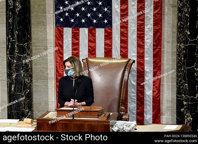 Speaker of the United States House of Representatives Nancy Pelosi (Democrat of California) announces the vote count for H.R
