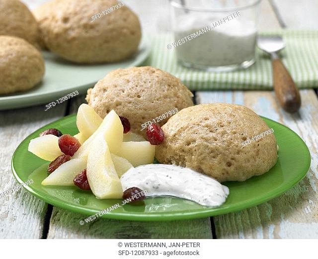Steamed spelt balls with a pear and cranberry compote
