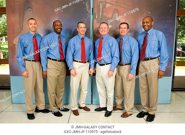 STS-129 crew members pose for a portrait following a preflight press conference at NASA's Johnson Space Center. From the left are astronauts Randy Bresnik and...