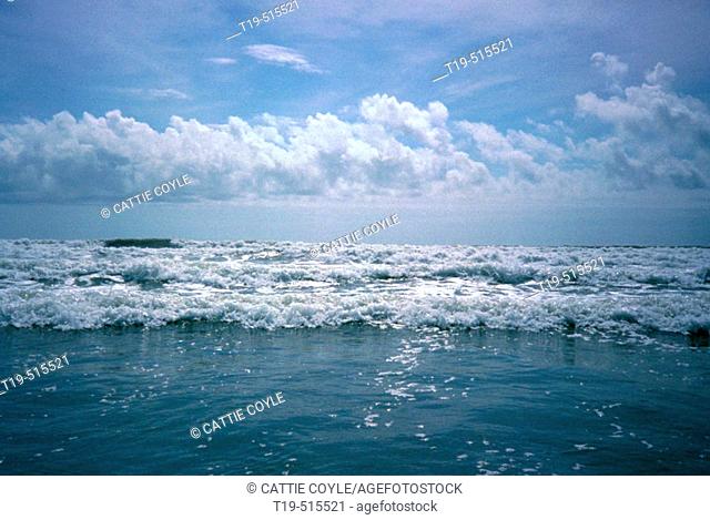 Atlantic ocean, breaking waves, water, blue sky, clouds, Easton's Beach, First Beach, Newport, Rhode Island. USA