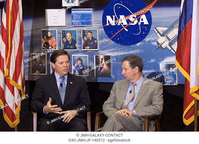 U.S. Representative Tom DeLay (R.-Texas) meets the media in the Space Vehicle Mockup Facility during a visit to the Johnson Space Center