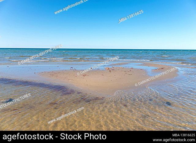 View under a clear sky of the Baltic Sea on the beach of Laboe, Germany