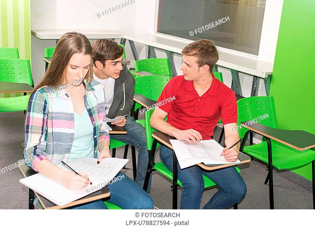 Teenagers studying