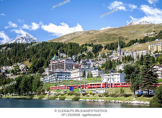 The Bernina Express passing by Saint Moritz, Engadine, Switzerland Europe