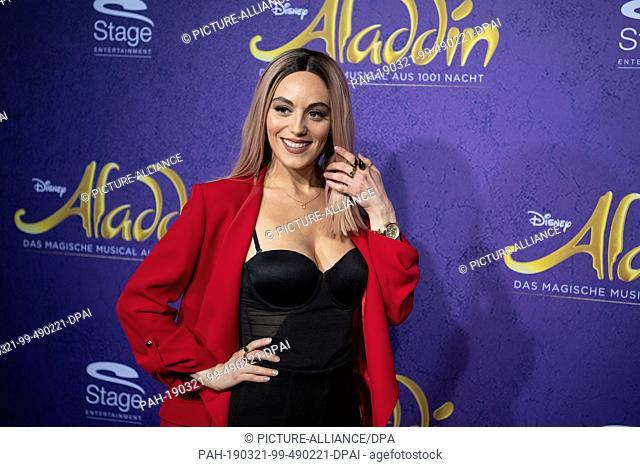 21 March 2019, Baden-Wuerttemberg, Stuttgart: Jenny Marsala, singer, comes over the red carpet to the premiere of the musical ""Aladdin""