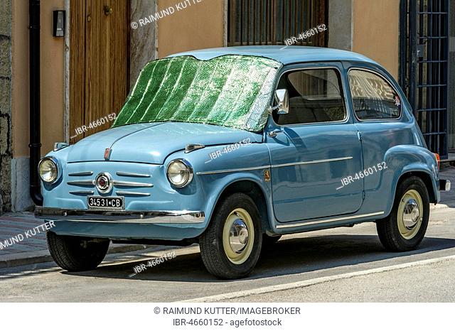 Blue FIAT 600, Seicento, oldtimer, with sun protection on windscreen, Molise, Italy