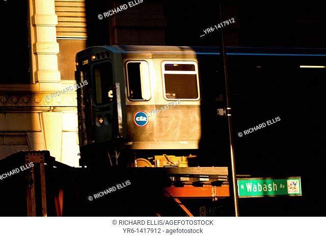 A train in the Chicago rapid transit system known as the'L' arrives in a station in the LOOP in Chicago, IL, USA