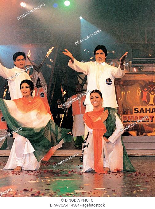 South Asian Indian actors Shahrukh Khan , Aishwarya Rai , Raveena Tandon and Amitabh Bachchan at a sahara function in Lucknow , India NO MR