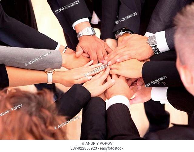 Business People With Their Hands Together