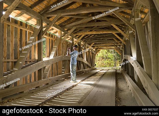 This 97 foot burr truss covered bridge has several names. The most mommon is Gristmill Bridge bercause there is a grist mill just down river