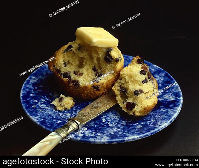 A Pat of Butter Melting on a Blueberry Muffin