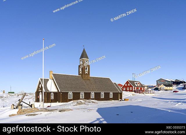 Zions Church, a landmark of Ilulissat. Winter in Ilulissat on the shore of Disko Bay. America, North America, Greenland, Denmark