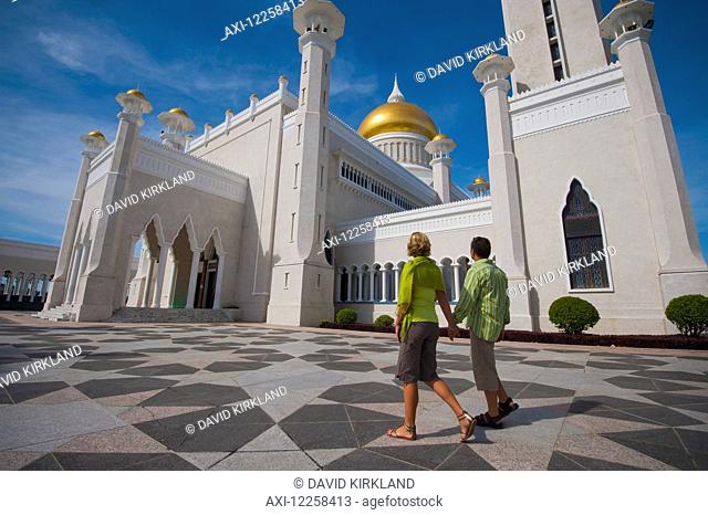 Couple at Sultan Omar Ali Saifuddien Mosque; Bandar Seri Begawan, Brunei