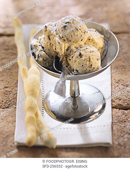 Chocolate stracciatella ice cream, with vanilla grissini