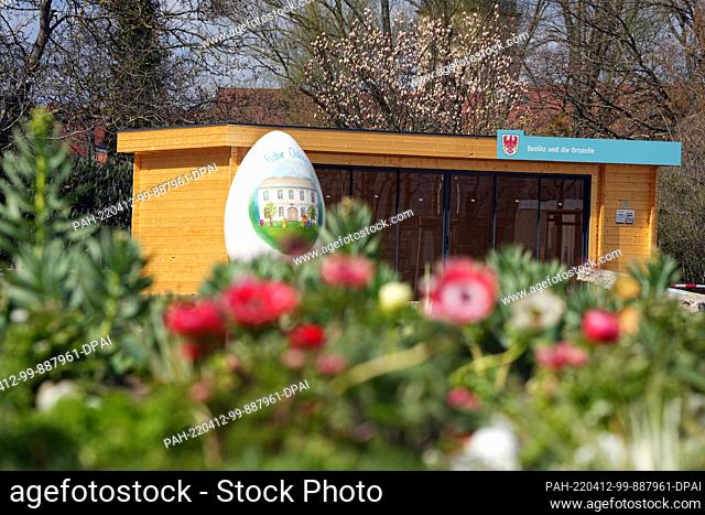11 April 2022, Brandenburg, Beelitz: An oversized Easter egg stands on the grounds of the Brandenburg State Garden Show (Laga). The Laga opens on 14