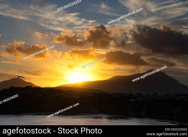 Magic sunset over Procida Island with Ischia island in the background