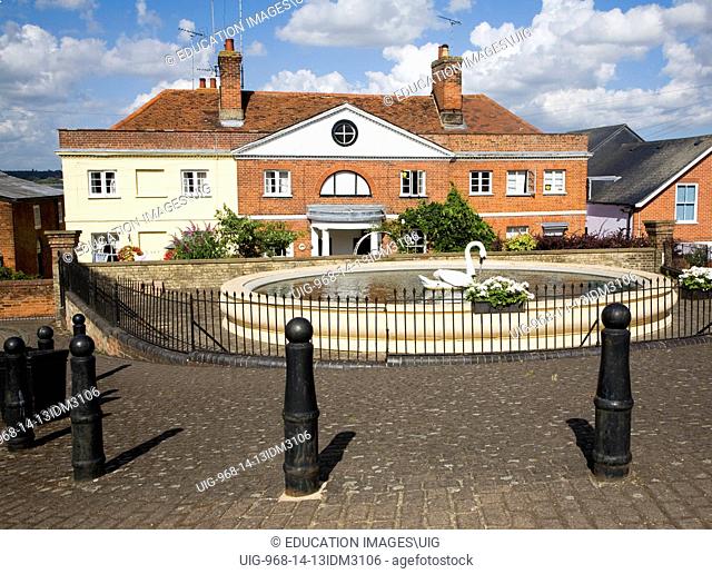 Swan basin pond and historic buildings, Mistley, Essex, England
