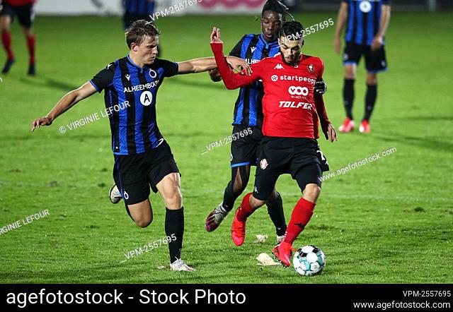 Club NXT's Ibe Hautekiet, Club NXT's Nathan Fuakala and Seraing's Georges Mikautadze fight for the ball during a soccer match between RFC Seraing and Club...