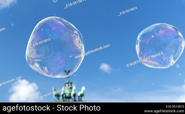 Germany, Berlin. Brandenburg Gate. Large bubbles floating in the air above Pariser Platz