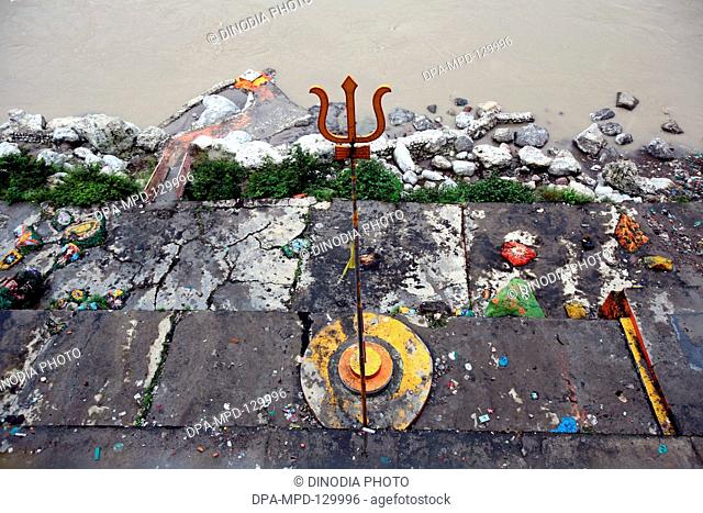 Lord Shiva's Trishul places at the Trayambakeshwar temple and the Lakshman jhula situated over Ganga River at Rishikesh  ;  Uttaranchal ; India