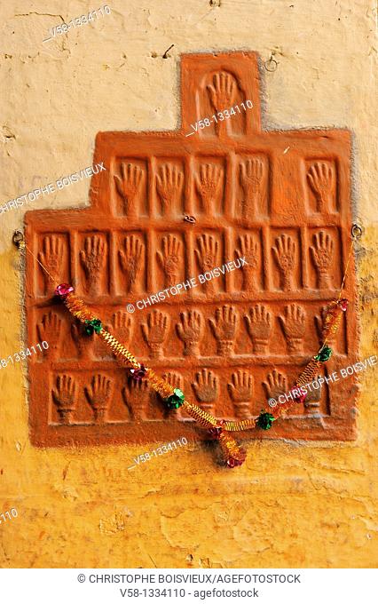 India, Rajasthan, Jodhpur, Mehrangarh fort, Hand prints of the princesses and concubines who committed Sati  Sati is the ancient practice where a widowed Hindu...