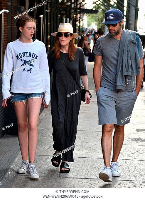 Julianne Moore takes a stroll with her film director husband Bart Freundlich and their daughter Liv in SoHo Featuring: Julianne Moore, Bart Freundlich