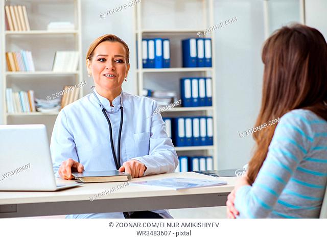 Woman visiting female doctor for regular check-up