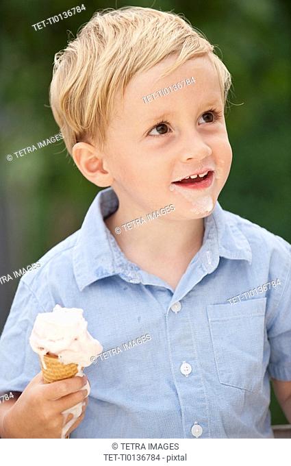 Child eating ice cream cone