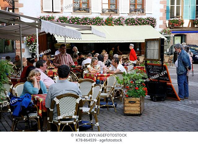 Sep 2008 - People sitting at an outdoors restaurant in Ribeauville village, Alsace, France