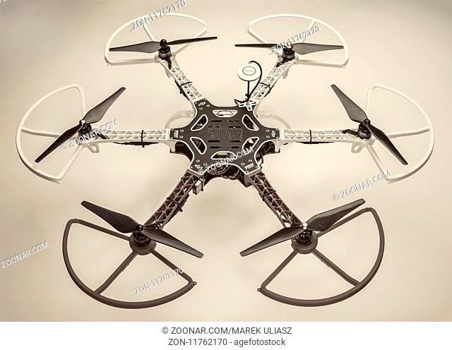 FORT COLLINS, CO, USA, December 13, 2014: Radio controlled DJI F550 Flame Wheel hexacopter drone with propeller guards. This drone is assembled from a kit