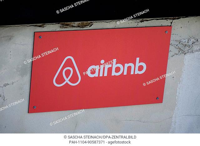 Picture of a parking space reservation sign with the logo of rental platform airbnb in Brunnenstrasse in the Mitte neighbourhood of Berlin
