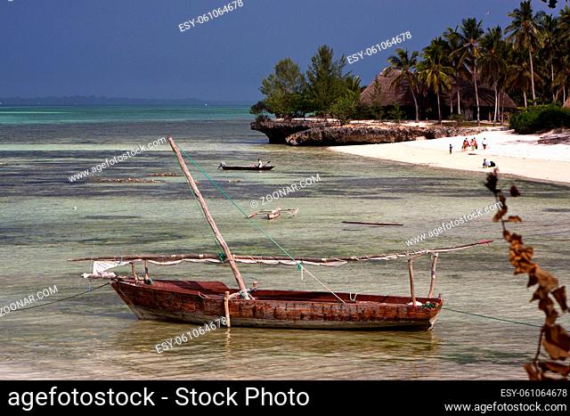 people cabin costline boat pirague in the blue lagoon relax of zanzibar africa