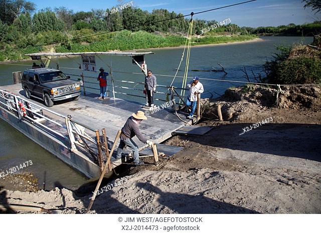 Los Ebanos, Texas - The hand-pulled car ferry which crosses the Rio Grande river (Rio Bravo del Norte) from Los Ebanos, Texas USA to Diaz Ordaz