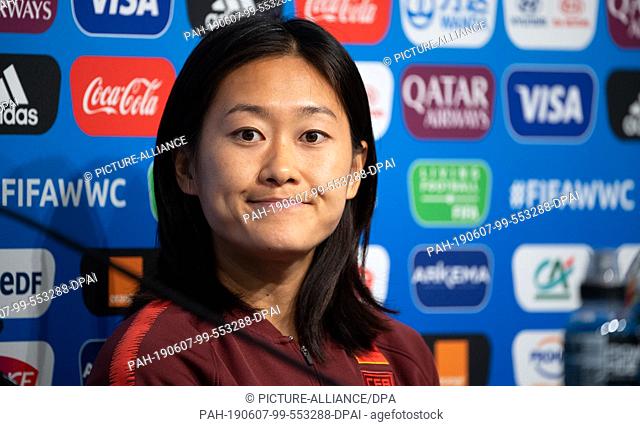 07 June 2019, France (France), Rennes: Football, women, World Cup, national team, China, press conference: Captain Haiyan Wu takes part in a press conference