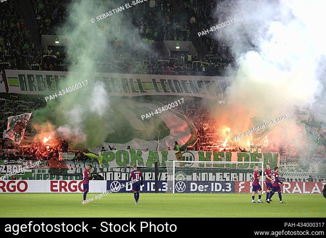 firo: October 31, 2023, football, football: season 2023/2024, 23/24 DFB Cup, 2nd round, VfL Wolfsburg - RB Leipzig pyro, fireworks, fans, fan curve