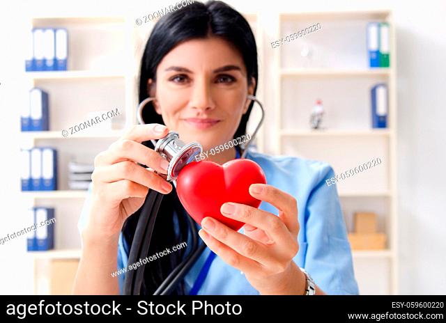 Female doctor cardiologist working in the clinic