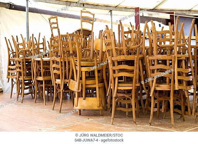 Heap of wooden chairs