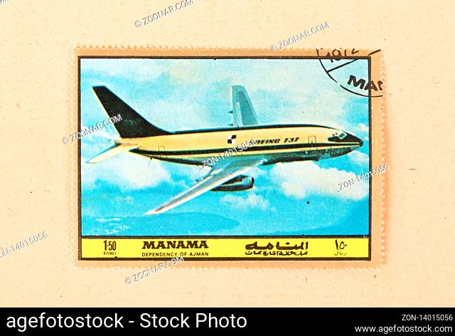 UNITED ARAB EMIRATES - CIRCA 1980: A stamp printed in the UAE shows an old airplane (Boeing 737), circa 1980